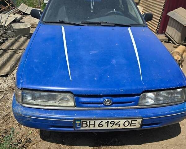 Синий Мазда 626, объемом двигателя 2.2 л и пробегом 450 тыс. км за 1200 $, фото 1 на Automoto.ua