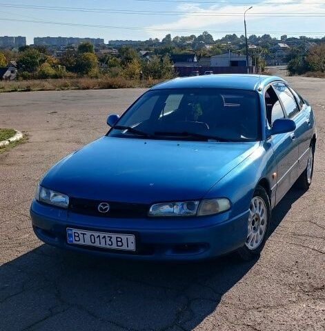 Синій Мазда 626, об'ємом двигуна 2 л та пробігом 400 тис. км за 2000 $, фото 1 на Automoto.ua