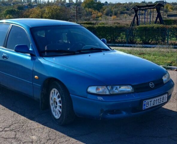 Синий Мазда 626, объемом двигателя 1.99 л и пробегом 300 тыс. км за 1100 $, фото 1 на Automoto.ua