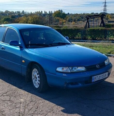 Синий Мазда 626, объемом двигателя 2 л и пробегом 300 тыс. км за 1500 $, фото 1 на Automoto.ua