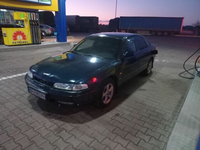 Синий Мазда 626, объемом двигателя 1.8 л и пробегом 300 тыс. км за 1600 $, фото 1 на Automoto.ua