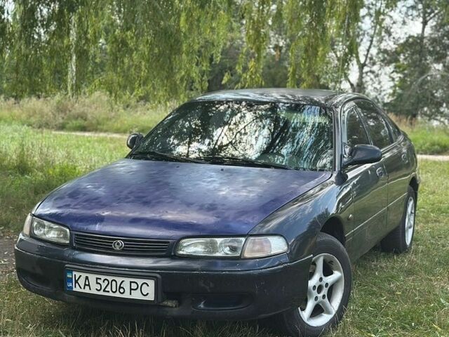 Синий Мазда 626, объемом двигателя 1.84 л и пробегом 401 тыс. км за 1500 $, фото 1 на Automoto.ua