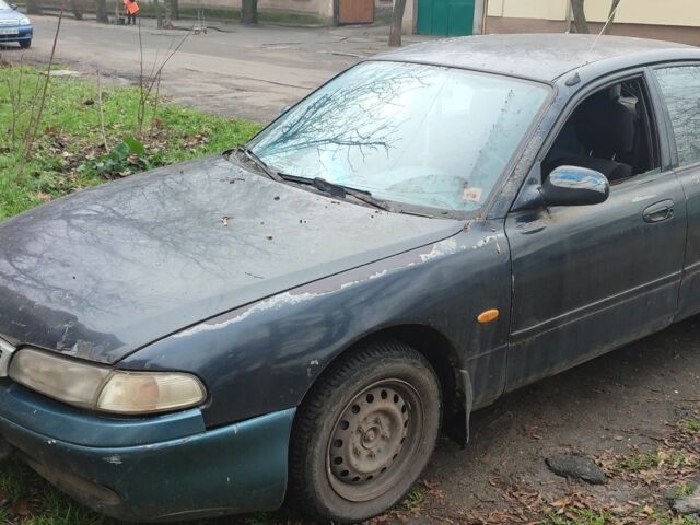 Синий Мазда 626, объемом двигателя 1.8 л и пробегом 450 тыс. км за 1500 $, фото 1 на Automoto.ua