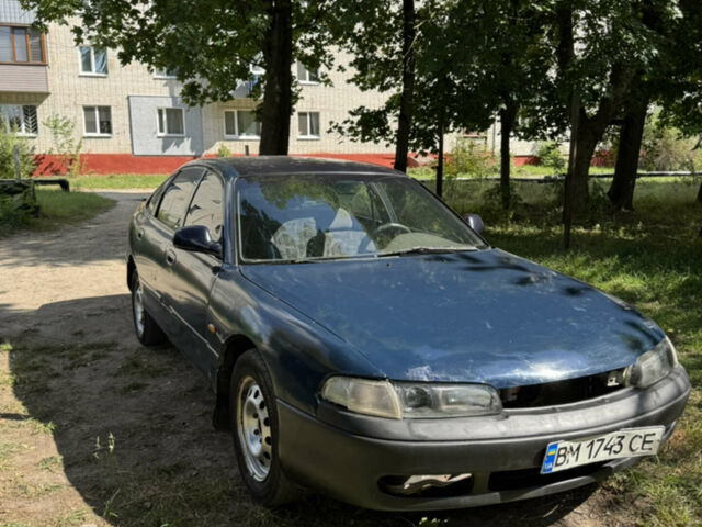 Синий Мазда 626, объемом двигателя 2 л и пробегом 300 тыс. км за 1600 $, фото 1 на Automoto.ua