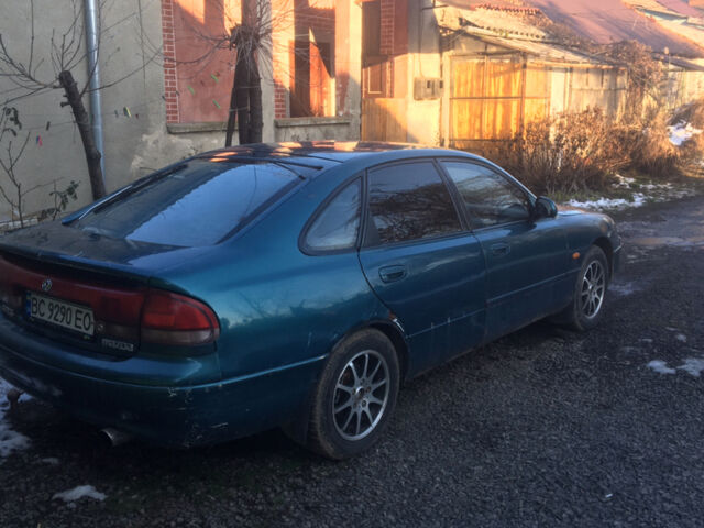 Синий Мазда 626, объемом двигателя 2 л и пробегом 500 тыс. км за 2100 $, фото 1 на Automoto.ua