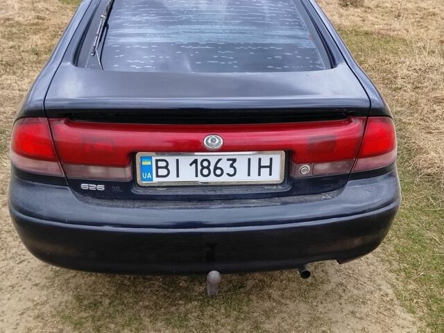 Синий Мазда 626, объемом двигателя 1.84 л и пробегом 133 тыс. км за 1550 $, фото 1 на Automoto.ua