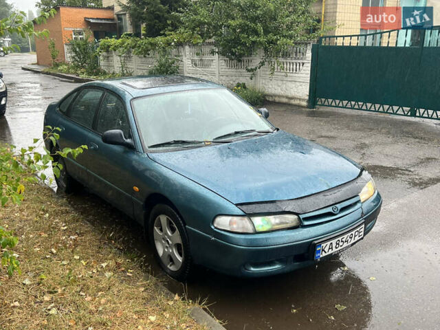 Синий Мазда 626, объемом двигателя 2 л и пробегом 323 тыс. км за 1400 $, фото 1 на Automoto.ua
