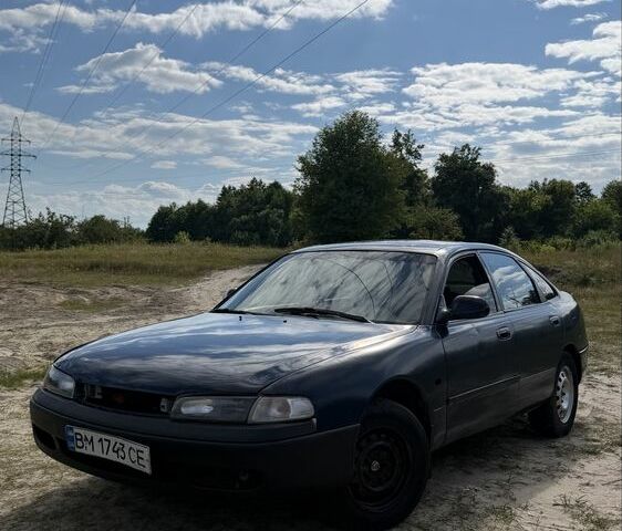 Синий Мазда 626, объемом двигателя 2 л и пробегом 400 тыс. км за 1400 $, фото 1 на Automoto.ua