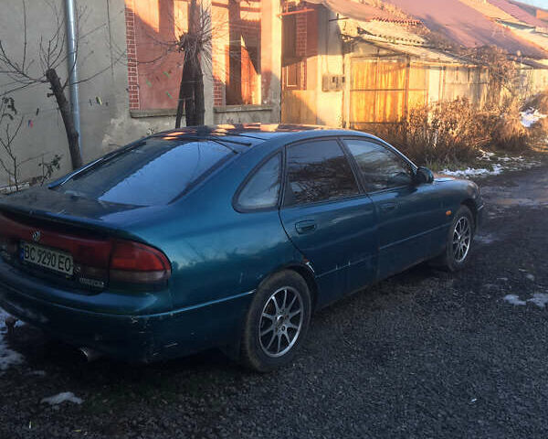 Синий Мазда 626, объемом двигателя 2 л и пробегом 500 тыс. км за 2100 $, фото 1 на Automoto.ua