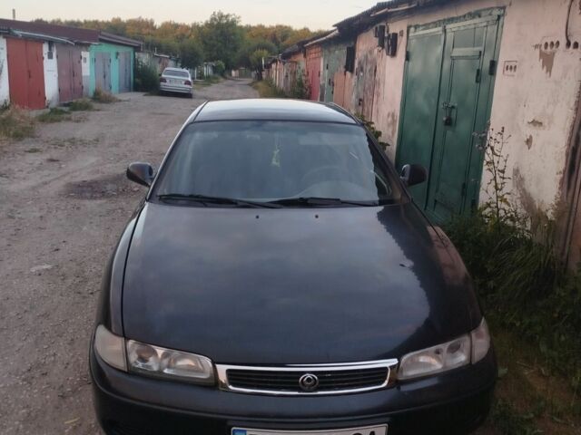 Синий Мазда 626, объемом двигателя 1.8 л и пробегом 400 тыс. км за 1600 $, фото 1 на Automoto.ua
