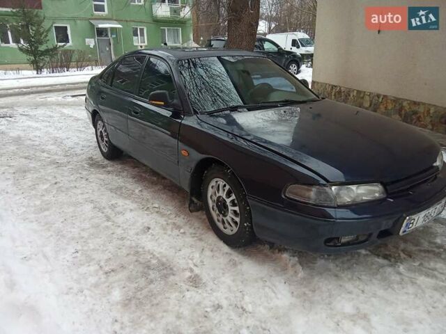 Синий Мазда 626, объемом двигателя 1.84 л и пробегом 250 тыс. км за 1350 $, фото 1 на Automoto.ua