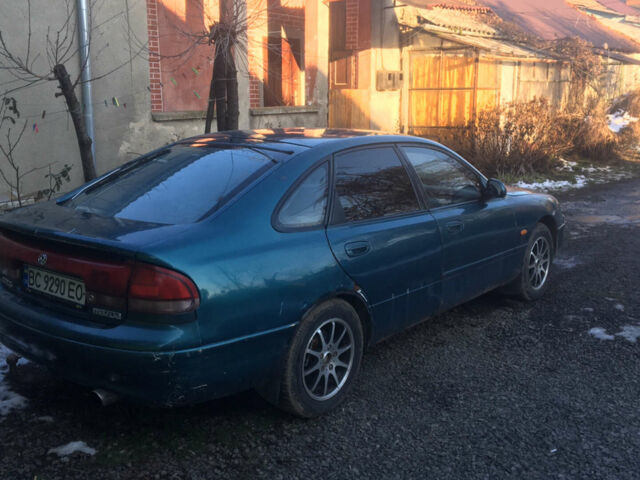 Синий Мазда 626, объемом двигателя 2 л и пробегом 500 тыс. км за 2100 $, фото 1 на Automoto.ua