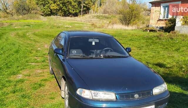 Синий Мазда 626, объемом двигателя 1.8 л и пробегом 280 тыс. км за 2500 $, фото 1 на Automoto.ua