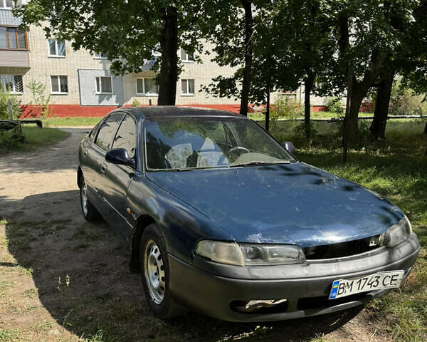 Синій Мазда 626, об'ємом двигуна 2 л та пробігом 300 тис. км за 1900 $, фото 1 на Automoto.ua