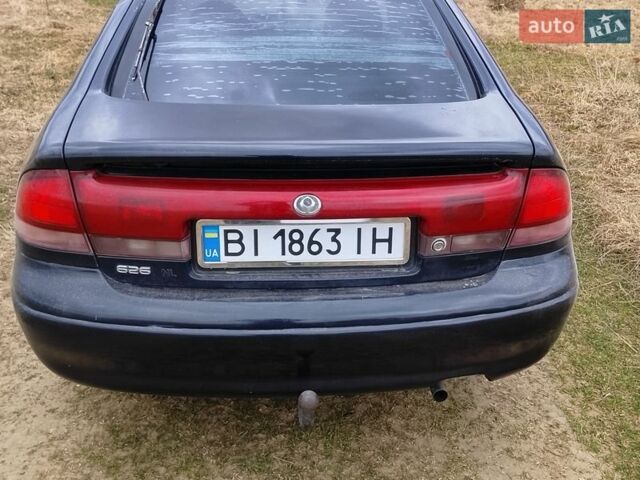 Синій Мазда 626, об'ємом двигуна 1.84 л та пробігом 133 тис. км за 1700 $, фото 1 на Automoto.ua