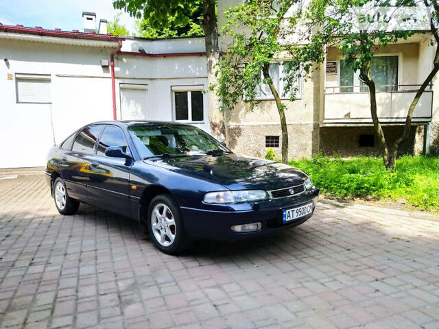 Синий Мазда 626, объемом двигателя 2 л и пробегом 317 тыс. км за 2500 $, фото 1 на Automoto.ua