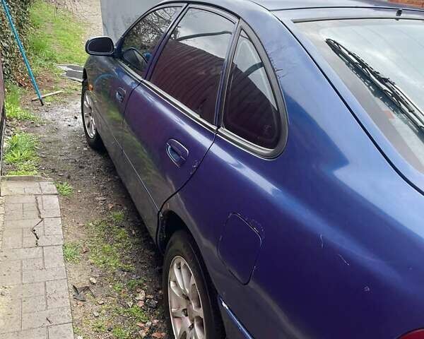 Синій Мазда 626, об'ємом двигуна 1.8 л та пробігом 300 тис. км за 1700 $, фото 1 на Automoto.ua