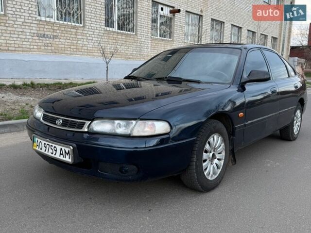 Синий Мазда 626, объемом двигателя 1.84 л и пробегом 250 тыс. км за 1800 $, фото 1 на Automoto.ua