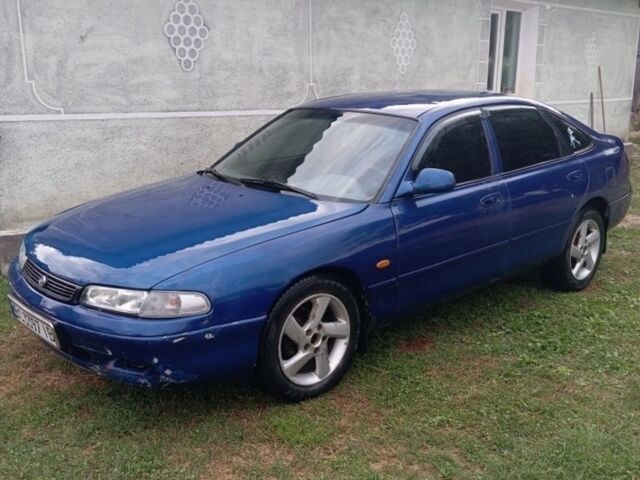Синий Мазда 626, объемом двигателя 2 л и пробегом 300 тыс. км за 1100 $, фото 1 на Automoto.ua