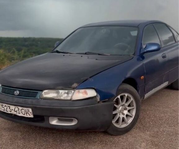 Синій Мазда 626, об'ємом двигуна 1.8 л та пробігом 300 тис. км за 1201 $, фото 1 на Automoto.ua