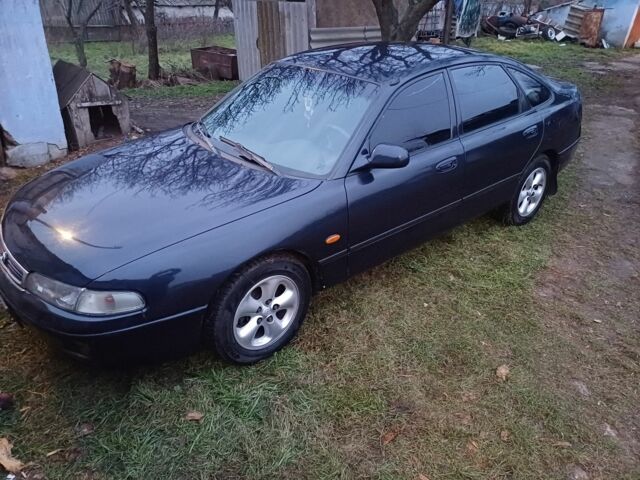 Синий Мазда 626, объемом двигателя 1 л и пробегом 400 тыс. км за 1900 $, фото 1 на Automoto.ua