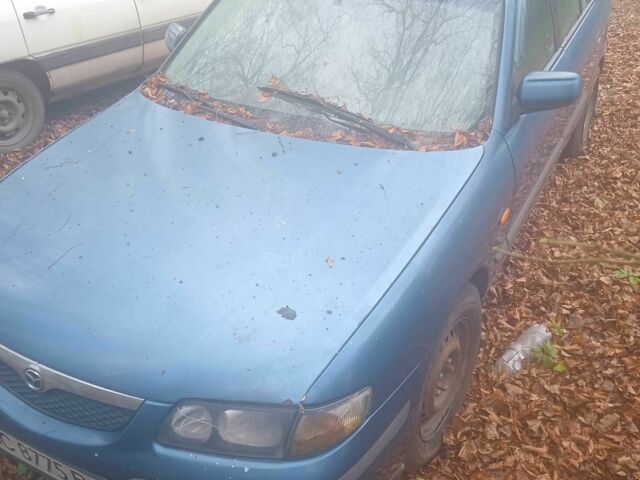 Синий Мазда 626, объемом двигателя 2 л и пробегом 3 тыс. км за 591 $, фото 1 на Automoto.ua