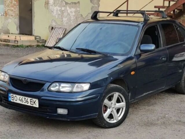 Синий Мазда 626, объемом двигателя 2 л и пробегом 123 тыс. км за 2500 $, фото 1 на Automoto.ua