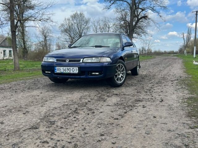 Синий Мазда 626, объемом двигателя 1.8 л и пробегом 435 тыс. км за 2300 $, фото 1 на Automoto.ua