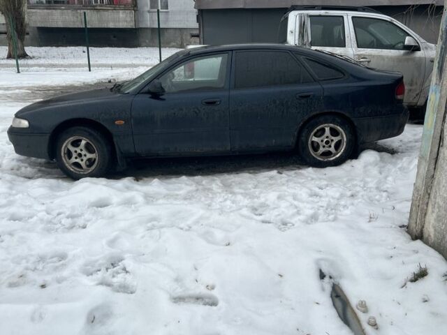 Синій Мазда 626, об'ємом двигуна 1.8 л та пробігом 350 тис. км за 1900 $, фото 1 на Automoto.ua