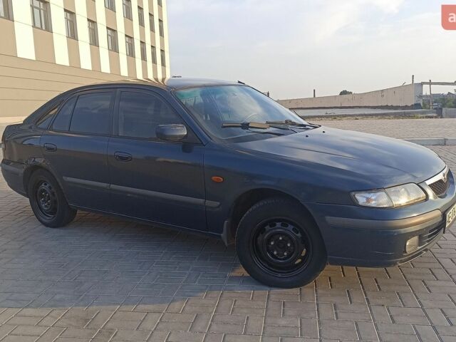 Синий Мазда 626, объемом двигателя 1.8 л и пробегом 418 тыс. км за 3000 $, фото 1 на Automoto.ua