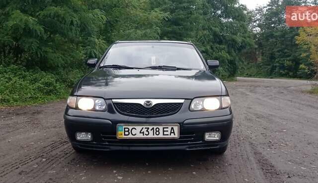 Синий Мазда 626, объемом двигателя 1.8 л и пробегом 319 тыс. км за 2300 $, фото 1 на Automoto.ua
