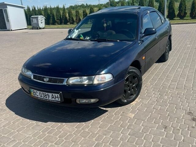 Синий Мазда 626, объемом двигателя 1.8 л и пробегом 330 тыс. км за 1200 $, фото 1 на Automoto.ua