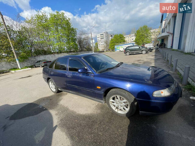 Синий Мазда 626, объемом двигателя 2.5 л и пробегом 341 тыс. км за 2800 $, фото 1 на Automoto.ua