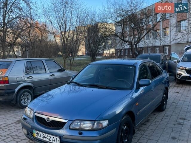 Синий Мазда 626, объемом двигателя 1.8 л и пробегом 468 тыс. км за 1500 $, фото 1 на Automoto.ua