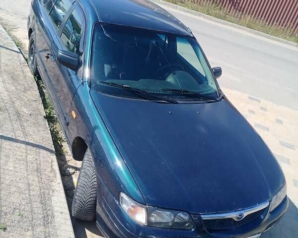 Синий Мазда 626, объемом двигателя 2 л и пробегом 450 тыс. км за 2500 $, фото 1 на Automoto.ua