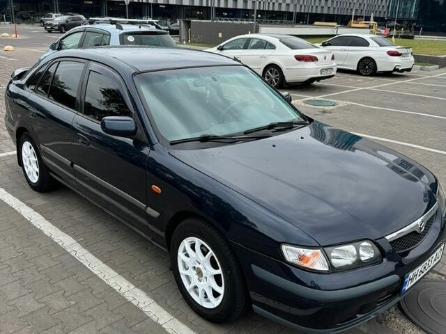 Синий Мазда 626, объемом двигателя 2 л и пробегом 312 тыс. км за 3650 $, фото 1 на Automoto.ua