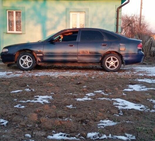Синій Мазда 626, об'ємом двигуна 1.8 л та пробігом 430 тис. км за 800 $, фото 1 на Automoto.ua