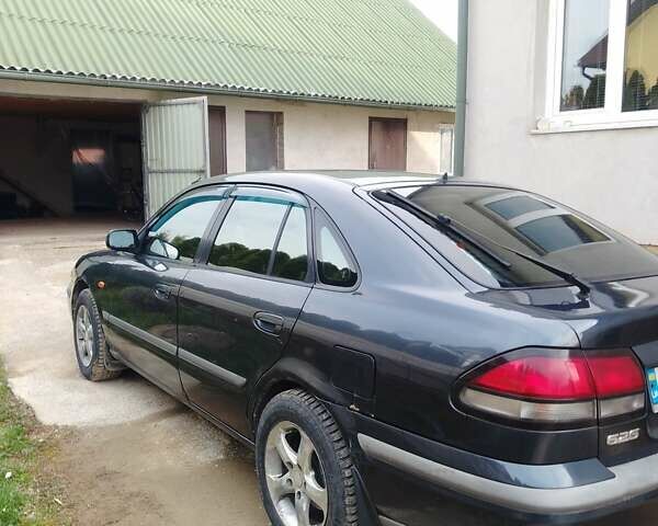 Синій Мазда 626, об'ємом двигуна 2 л та пробігом 360 тис. км за 2250 $, фото 1 на Automoto.ua