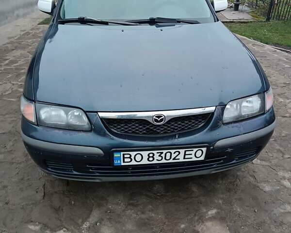 Синий Мазда 626, объемом двигателя 2 л и пробегом 280 тыс. км за 1700 $, фото 1 на Automoto.ua