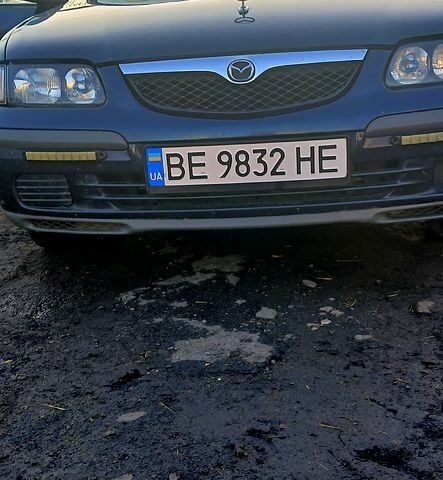 Синий Мазда 626, объемом двигателя 2 л и пробегом 400 тыс. км за 3000 $, фото 1 на Automoto.ua