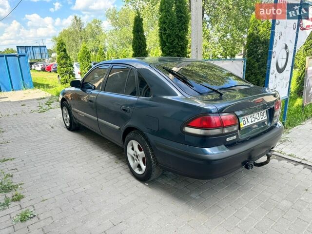 Синий Мазда 626, объемом двигателя 1.99 л и пробегом 395 тыс. км за 1650 $, фото 1 на Automoto.ua