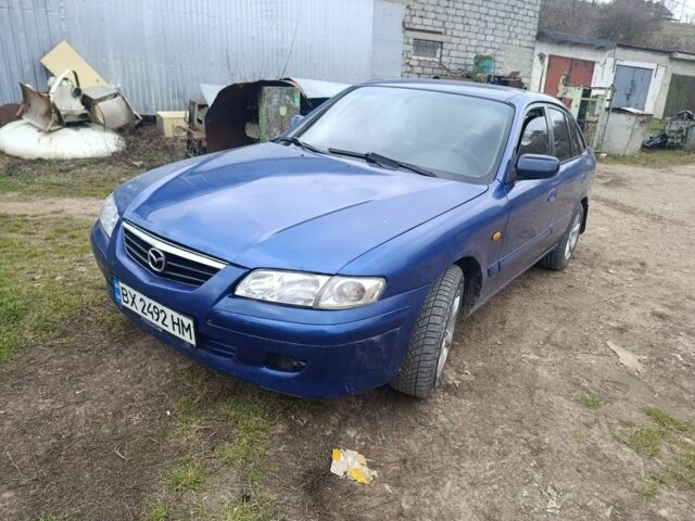 Синий Мазда 626, объемом двигателя 2 л и пробегом 140 тыс. км за 1999 $, фото 1 на Automoto.ua