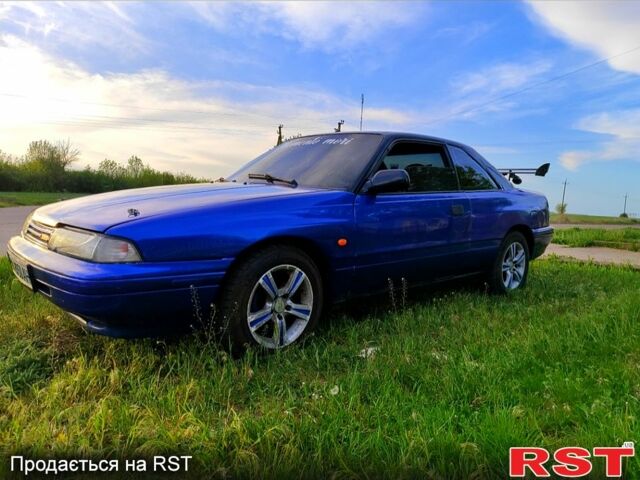 Синий Мазда 626, объемом двигателя 2.2 л и пробегом 211 тыс. км за 2000 $, фото 1 на Automoto.ua