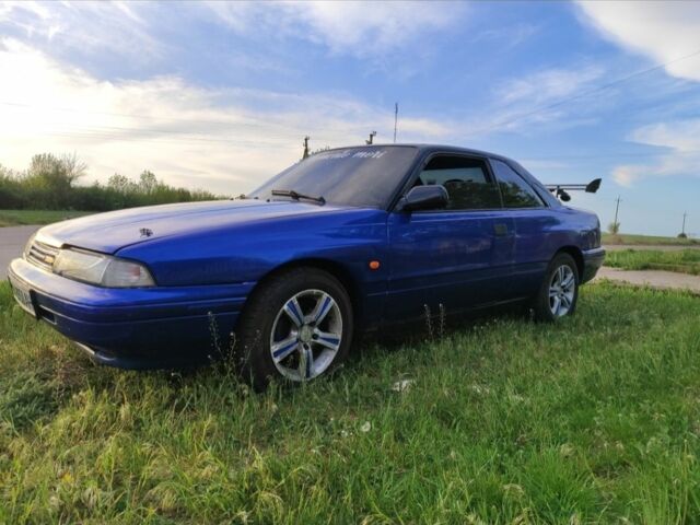 Синий Мазда 626, объемом двигателя 2.2 л и пробегом 200 тыс. км за 2000 $, фото 1 на Automoto.ua