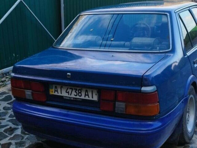 Синий Мазда 626, объемом двигателя 2 л и пробегом 300 тыс. км за 550 $, фото 1 на Automoto.ua