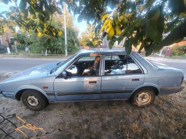 Синий Мазда 626, объемом двигателя 2 л и пробегом 319 тыс. км за 1002 $, фото 1 на Automoto.ua