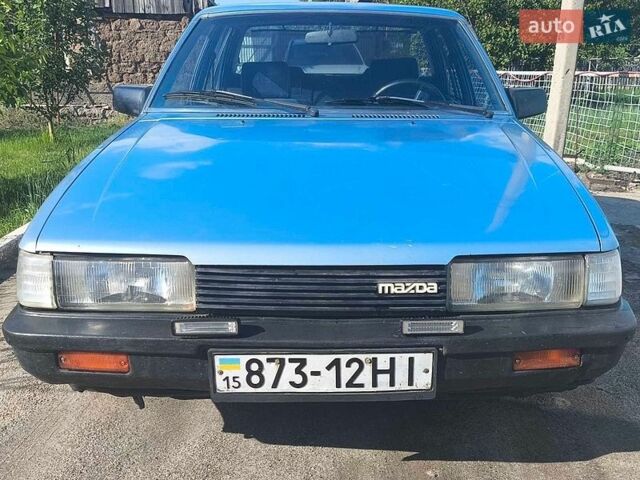 Синий Мазда 626, объемом двигателя 2 л и пробегом 320 тыс. км за 1400 $, фото 1 на Automoto.ua