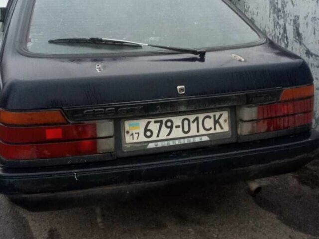 Синий Мазда 626, объемом двигателя 1.8 л и пробегом 481 тыс. км за 430 $, фото 1 на Automoto.ua