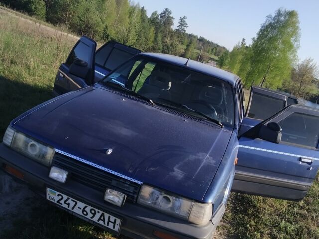Синий Мазда 626, объемом двигателя 2 л и пробегом 200 тыс. км за 1100 $, фото 1 на Automoto.ua