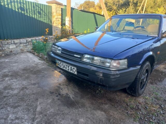 Синий Мазда 626, объемом двигателя 2 л и пробегом 100 тыс. км за 803 $, фото 1 на Automoto.ua